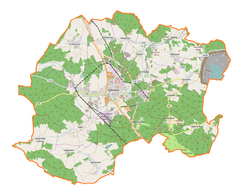 Mapa konturowa gminy Polkowice, blisko centrum na prawo znajduje się punkt z opisem „'''Zakłady Górnicze „Rudna”'''”
