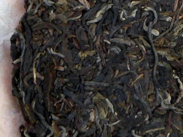 Relatively young raw pu'er; note the grey and dark green tones