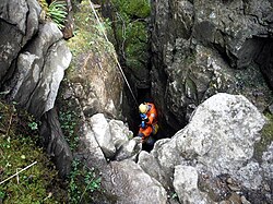 Rift-pot-entrance-on-ingleborough.jpg