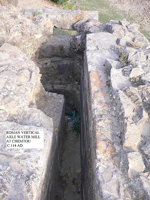 Roman turbine mill at Chemtou, Tunisia. The tangential water inflow of the mill race made the submerged horizontal wheel in the shaft turn like a true