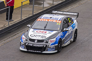Russell Ingall in Lucas Dumbrell Motorsport car 23, departing pitlane during the V8 Supercars Test Day (1).jpg