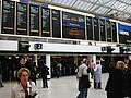 Solari departure boards at London Charing Cross station, 2002.jpg