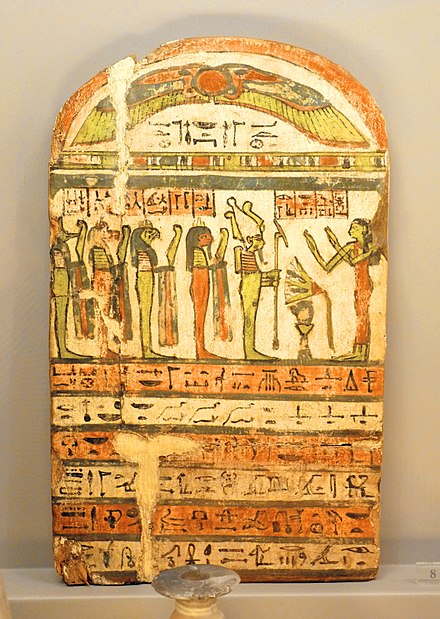 26th Dynasty stela depicting a deceased woman praying Osiris, with the four sons of Horus in line behind him. Archaeological Civic Museum of Bologna, Italy