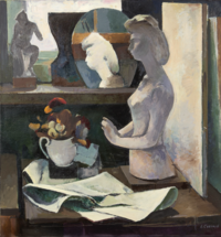 A sculpture on the table with a newspaper and small flower bouquet against the windowsill with objects and a mirror reflecting the profile of the sculpture.