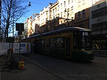 Streetcar passes sidewalk obstruction (40503926100).jpg