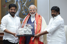 Chief Minister of Telangana Shri Revanth Reddy and Deputy Chief of Telangana Minister Shri Bhatti Vikramarka Mallu handing over an idol of a cow to Prime Minister of India Narendra Modi in New Delhi on 4th July, 2024