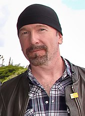 The Edge (pictured in 2011) separated from his wife during the recording of Achtung Baby. Their painful emotions were channelled in the lyrics. The edge u2 at brasilia 2011.jpg