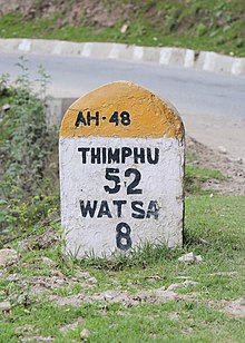 Thimphu and Watsa milestone.jpg