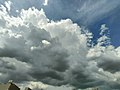 Towering cumulus with Cirrus clouds