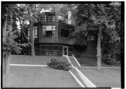 VIEW FROM NORTH OF NORTHWEST ELEVATION - House of Tomorrow, 241 Lake Front Drive (moved from Chicago, IL), Beverly Shores, Porter County, IN HABS IND,64-BEVSH,9-3.tif