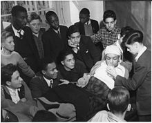 Wartime first aid class, when this was Benjamin Franklin High Victory Corps. Along with their English course, this class at Benjamin Franklin High School in New York City is... - NARA - 196329.jpg