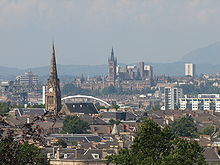 Panorama over Glasgow's South Side and West End from Queen's Park, looking north west. Left of centre can be seen the Clyde Arc bridge at Finnieston, while beyond is the tower of the University of Glasgow, with the Campsie Fells in the distance on the right. View of Glasgow from Queens Park.jpg
