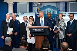 The White House Coronavirus Task Force briefing the media in March 2020. Trump received severe backlash for privately admitting to downplaying the severity of the virus. White House Press Briefing (49668784683).jpg