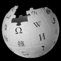 Wikipedia logo puzzle globe spins vertically, revealing the contents of all of its puzzle pieces.gif