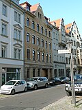 Apartment building in closed development and rear building