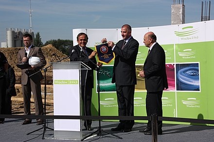 Michel Platini visiting the construction site of the Stadion Miejski, 2009