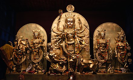 Goddess Durga and a pantheon of other gods and goddesses (Ganesh, Lakshmi, Sarasvati, Kartik) being worshipped during Durga Puja, North Kolkata