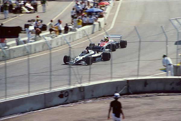 Nelson Piquet (Brabham-BMW) leads fellow Brazilian Ayrton Senna (Toleman-Hart).