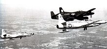 325th Fighter Group F-94 Starfires and F-82 Twin Mustang 317th FAWS North American F-82F Twin Mustang 46-418 with F-94 Starfires.jpg