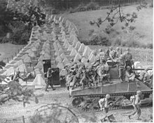 Division troops crossing the Siegfried line to Germany. 39th Infantry Brigade of the US Army crossing the Siegfried Line, Germany - September 1944.jpg