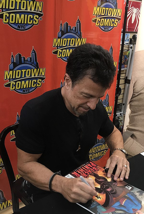 Artist John Romita Jr. signing a copy of the fourth Black Panther series at Midtown Comics in Manhattan