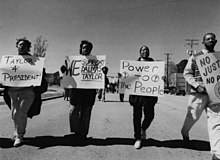 Black students advocating for Dalmas Taylor as interim president, 1995 African-American students holding signs and marching to support Provost Taylor to be appointed University of Texas at Arlington interim president when President Amacher resigned (10011733).jpg