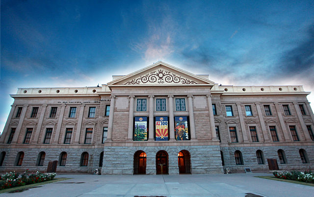 The facade of the Arizona Capitol building in bright daylight