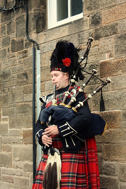 Bagpiper in traditional dress, Edinburgh