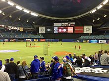 Olympic Stadium's blue roof and new scoreboard installed in 2015 Batting practice at Olympic Stadium in 2015.jpg