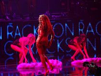 Beyonce performing "Party", which featured a Las Vegas showgirl theme Beyonce Party 2013.jpg