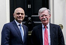 In 2019, John Bolton, then U.S. National Security Advisor meeting British Chancellor of the Exchequer Sajid Javid (left) at 11 Downing Street Bolton meets with new Chancellor Javid.jpg