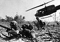 Major Bruce P. Crandall's UH-1D helicopter climbs after discharging infantrymen on a search and destroy mission in Ia Drang Valley in November 1965. .
