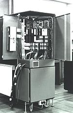 Archive photo from 1979, showing the inside of the machine and its connection to the Cambridge Ring. CAP computer 1979.jpg