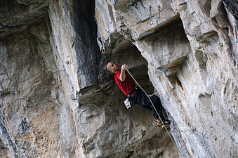 Lead climber clipping in, Canada