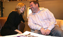 Moyles with Gabby Logan during a campaign to promote life in Leeds Chris Moyles and Gabby Logan.jpg