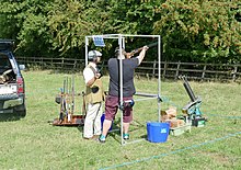 Clay pigeon shooting at a country fair, England Clay pigeon shooting at Hawkesbury Show arp.jpg