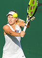 Daria Gavrilova competing in the first round of the 2015 Wimbledon Championships against Irina-Camelia Begu.