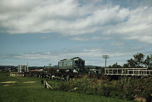 1901 crosses the Condamine River floodplain trestles on approach to Warwick station in 1987