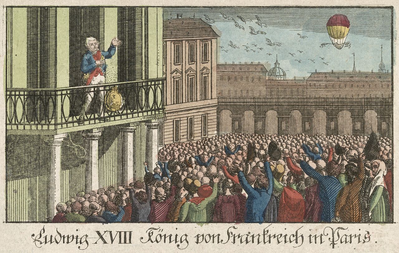 King Louis XVIII standing on a balcony and a crowd below watching a hot air balloon in the distance.