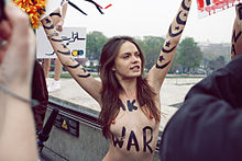 FEMEN protest in support of Aliaa Magda Elmahdy, Oksana Shachko pictured here in March 2012 Femen a Paris 10.jpg