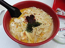 A typical bowl of Katong Laksa in Singapore First time trying Katong.Laksa. Thumbs up. Fragrant, creamy, light. I like. -vernenoms (33503880125).jpg