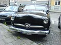 Ford V8 Fordor, 1949-50, custom front, black.