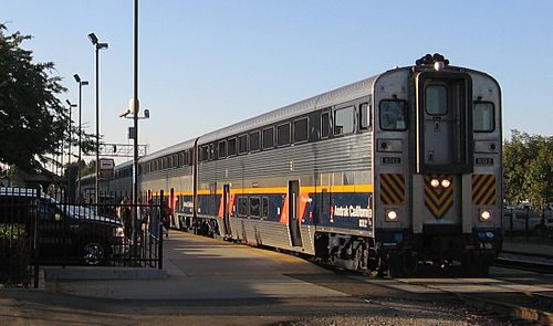 A bi-level "California Car" trainset on the San Joaquins at Fresno station