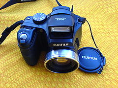 Fujifilm FinePix S5700 Digital camera black - front view.JPG