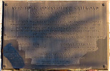 Plaque on Hell Gate Bridge commemorating the opening of the NYCR in 1917 Hell Gate Bridge plaque.jpg