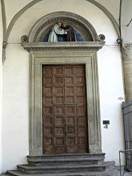 File:Ingresso alla Chiesa, sopra una lunetta di terracotta invetriata di Andrea della Robbia, 1489.JPG