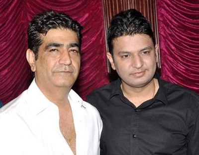 Krishan Kumar (left) and CEO Bhushan Kumar (right), the brother and son of Gulshan Kumar, respectively, during the audio release of Aashiqui 2 (2013)