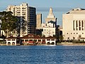 Panoramic photograph of the Lake Merritt Wild Duck Refuge, surrounded by the buildings of Oakland.
