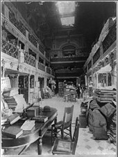 Library of Congress in the Capitol Building in the 1890s Library of Congress, showing three levels crowded with stacks of books and newspapers LCCN2017646700.jpg