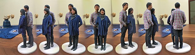 3D selfie in 1:20 scale printed by Shapeways using gypsum-based printing, created by Madurodam miniature park from 2D pictures taken at its Fantasitro